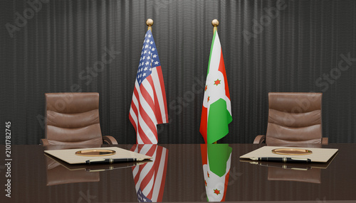 Tableau sur toile Diplomatic Meeting Room: Two flags, the United States and Burundi, stand tall behind empty chairs at a polished table, symbolizing international relations and negotiation in a formal setting
