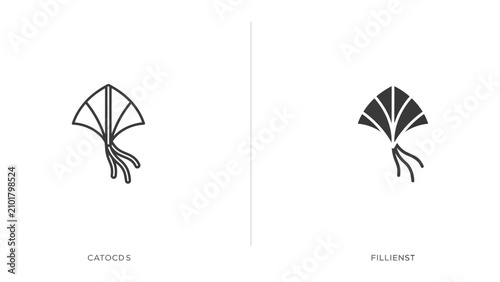 Two of a traditional kite, one in outline and one in solid black, isolated on a white background flying