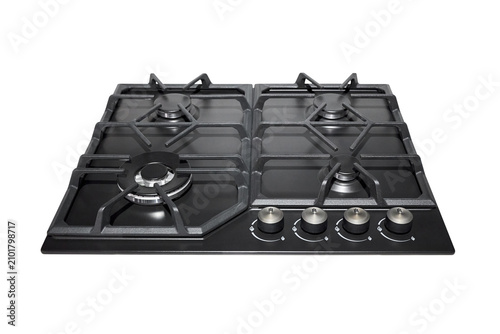 Modern black gas stove hob with four burners, cast iron supports, and mechanical knobs isolated on white backdrop is ready for contemporary kitchen interior visualization.
