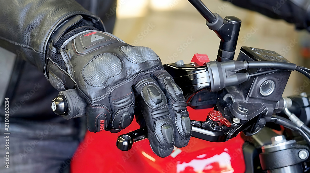 Fototapeta premium Use of gloves for riding safety.