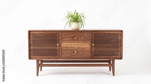 Elegant midcentury modern walnut wooden sideboard featuring two drawers and louvered doors on white background