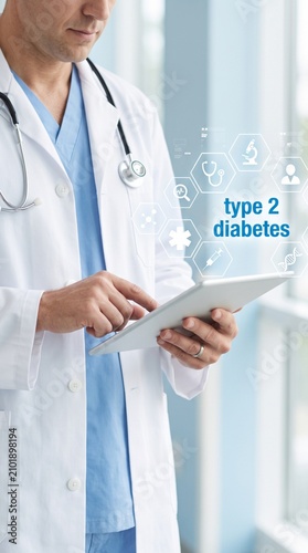 Doctor using tablet with diabetes info. Physician reviewing patient data.