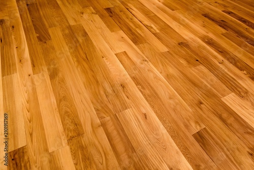 Golden amber hardwood floor parquet texture seamless background