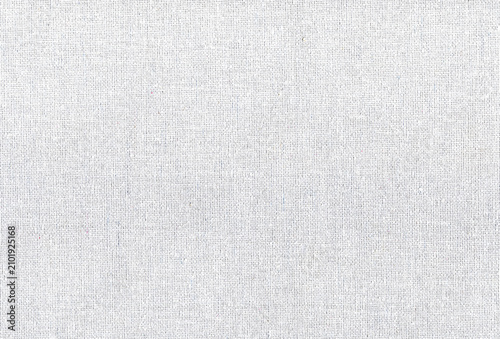 Fotografie Raised woven ridges travel through cotton duck canvas as closely interlaced thre