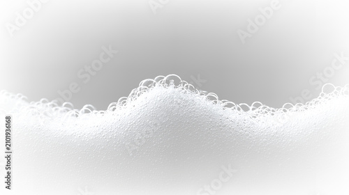 Konstfotografi Foam curls form on the surface of liquid with bubbles floating in clear space du