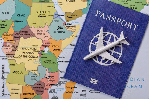 International passport against a map backdrop, concepts of travel. Passport on a map