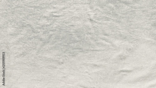 minimalist off white woven fabric texture shows fine organic linen threads in a serene flat lay composition