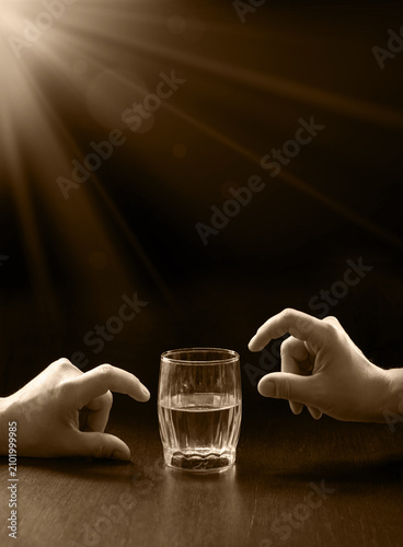 Obraz na plátně An optimist and a pessimist's opinion about a glass of water
