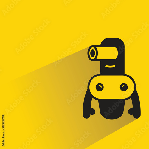 Canvas Print droid robot with shadow on yellow background