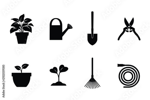 Fotografie Gardening tools and plant set featuring potted plants seedlings watering can sho