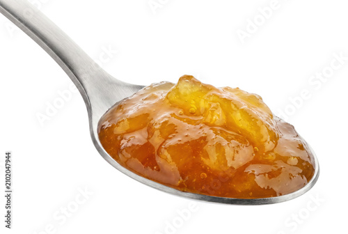 Cuadro en lienzo Spoonful of chunky fruit marmalade on a silver spoon