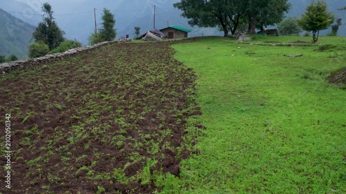 Plowed field in mountain landscape