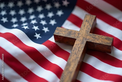 Union and Patriotism: Wooden Christian Cross on American Flag, up close.