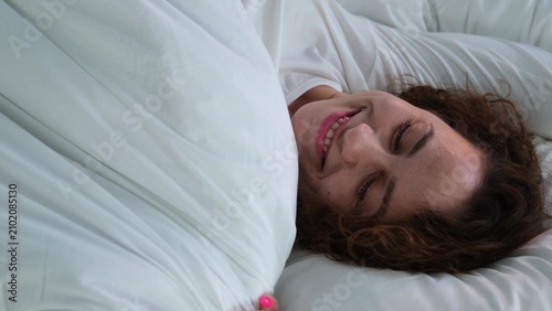Принти на полотні Young woman sleeping in bed