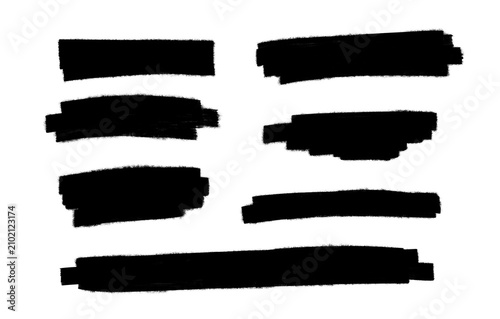Set of black thick marker highlight swatches and brush strokes isolated on a white background