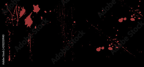 Abstract red blood splatter texture isolated on a solid black background.