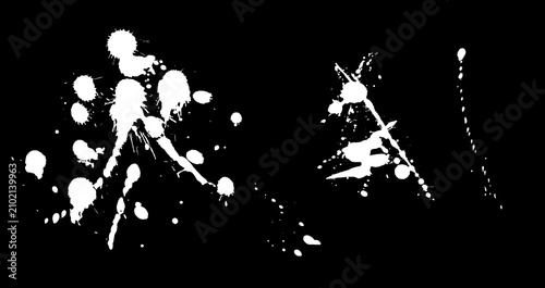 Abstract white paint splatters on a solid black background.