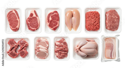 assortment of fresh raw meat cuts arranged neatly in white trays against a bright white backdrop ready for sale or cooking