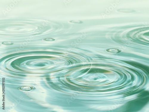 Abstract water surface with ripples and concentric circles droplets abstract transparent background disturbance environment reflection minimalist artistic close-up