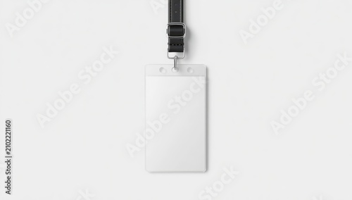 Empty badge with dark lanyard on light backdrop.