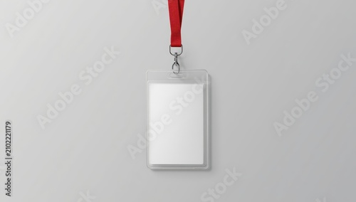 Empty badge with red strap on gray backdrop