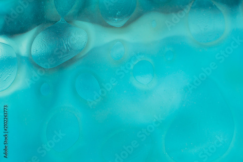 Abstract light blue liquid bubbles and water drops texture background