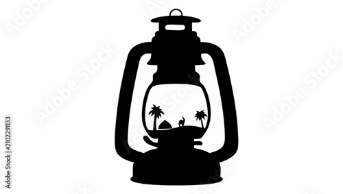 A black silhouette of a traditional oil lantern containing a miniature desert landscape scene with a camel and palm trees isolated on white background