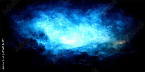 фотографія Abstract blue glowing nebula with bright light in dark cosmic background