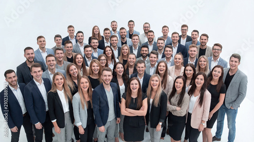 Large group of business people smiling in studio portrait, diverse office team in formal clothes