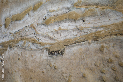 Abstract Weathered Stone Texture with Natural Rock Layers and Earth Tone Pattern