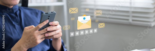 Email communication and digital messaging technology concept with person using smartphone for business correspondence