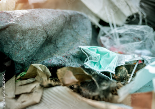Принти на полотні Used face mask discard in household garbage