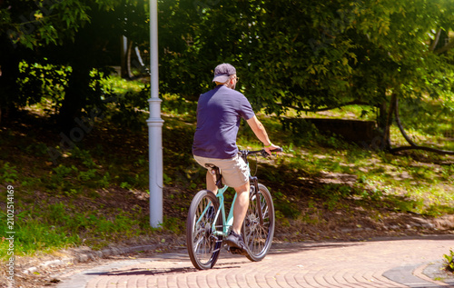 Canvastavla Cyclist ride on the bike path in the city Park