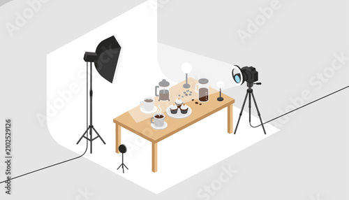 Professional food photography studio setup with a camera on a tripod, a softbox light, and spotlights focusing on coffee and cupcakes.