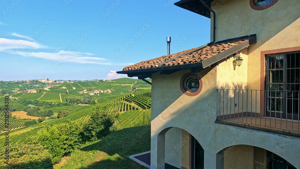 Obraz premium Scenic View of Barbaresco Vineyards from a Traditional Italian Villa