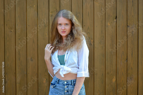 Natural beauty and tranquility: a girl with freckles on a summer day