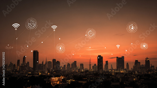Social media fo city and Smart digital Innovation city with connection network reciprocity over the cityscape. of future smart wireless city and social media networking systems that connects business