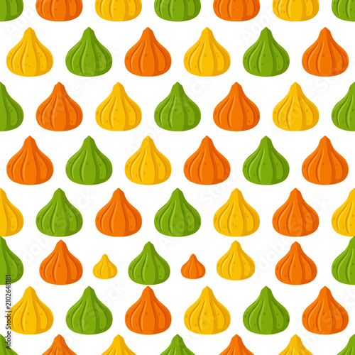 Colorful meringue kisses pattern on white background