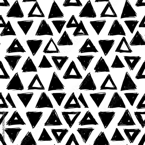 Hand-painted black triangles create a dynamic, abstract geometric pattern