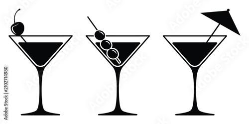 Fotografie Conjunto de tres copas de martini en blanco y negro con adornos
