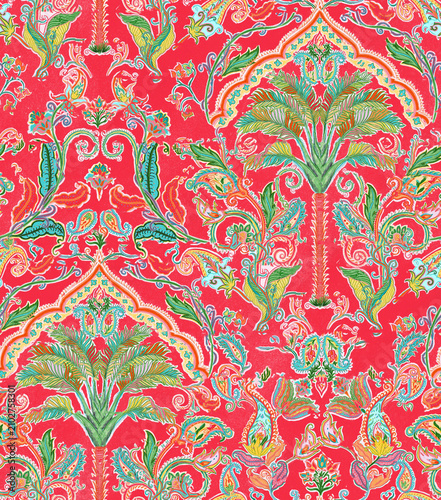 Seamless traditional damask-style pattern with intricate paisley and palm motifs in vibrant green, teal, and yellow on a bold red background.