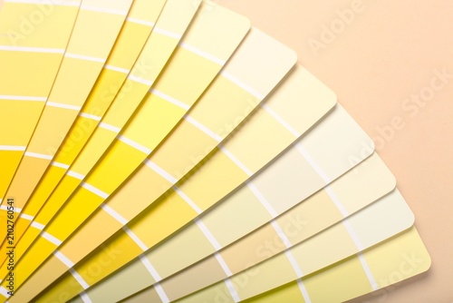 close up of a stack of yellow paint