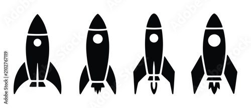 Obraz na płótnie 白い背景に配置したシンプルな黒いロケット4機セット