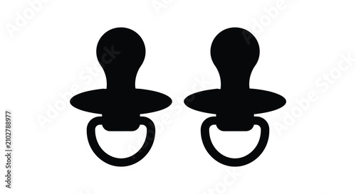 Foto Two baby pacifiers depicted as a black silhouette
