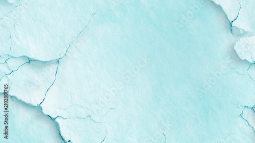 Cracked turquoise surface with an abstract texture, ideal for backgrounds, overlays, or presentations, demonstrating a modern aesthetic and versatility for various design projects