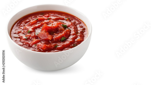 Tomato sauce with herbs in a bowl during bright studio lighting isolated on transparent background