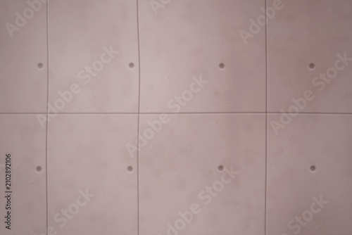 Photos Concrete wall texture with grid pattern