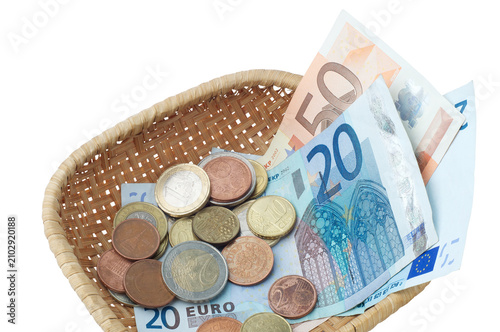 Obraz na płótnie A little basket with money, making a collection for benefaction