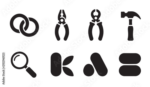 Fotografie Basic jewelry workshop symbols with interlocking rings pliers hammer and magnifying glass