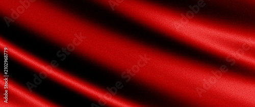 A close up view of luxurious red silk fabric featuring elegant flowing waves, smooth texture, and soft dark shadows, perfect for backgrounds or luxury design concepts